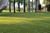 close-up of artificial turf playground safety surface